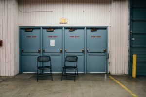 Four fire doors in a large room